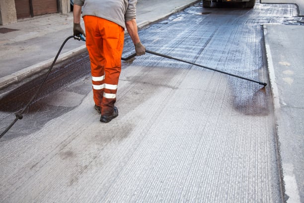 Construction Worker Road Spray Down.jpg