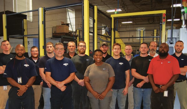 Group picture of Dixon's apprentices, steering committee members and on-the-job trainers