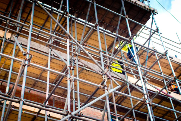 new building construction with scaffolding_iStock-951855926