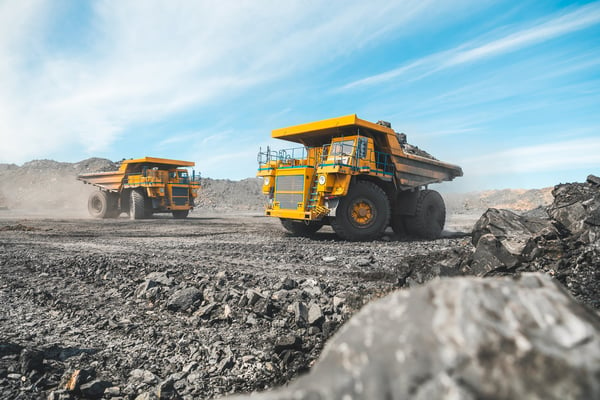 Large-quarry-dump-truck-loading-rock-coal-in-dumper