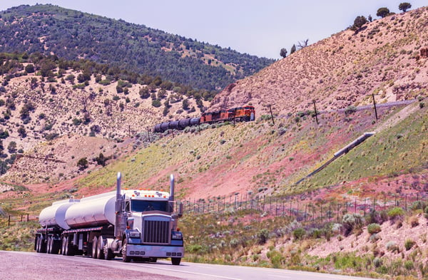 Slow-Motion-Freight-Transportation-Race-Uphill-Through-Utah-Mountain-Pass
