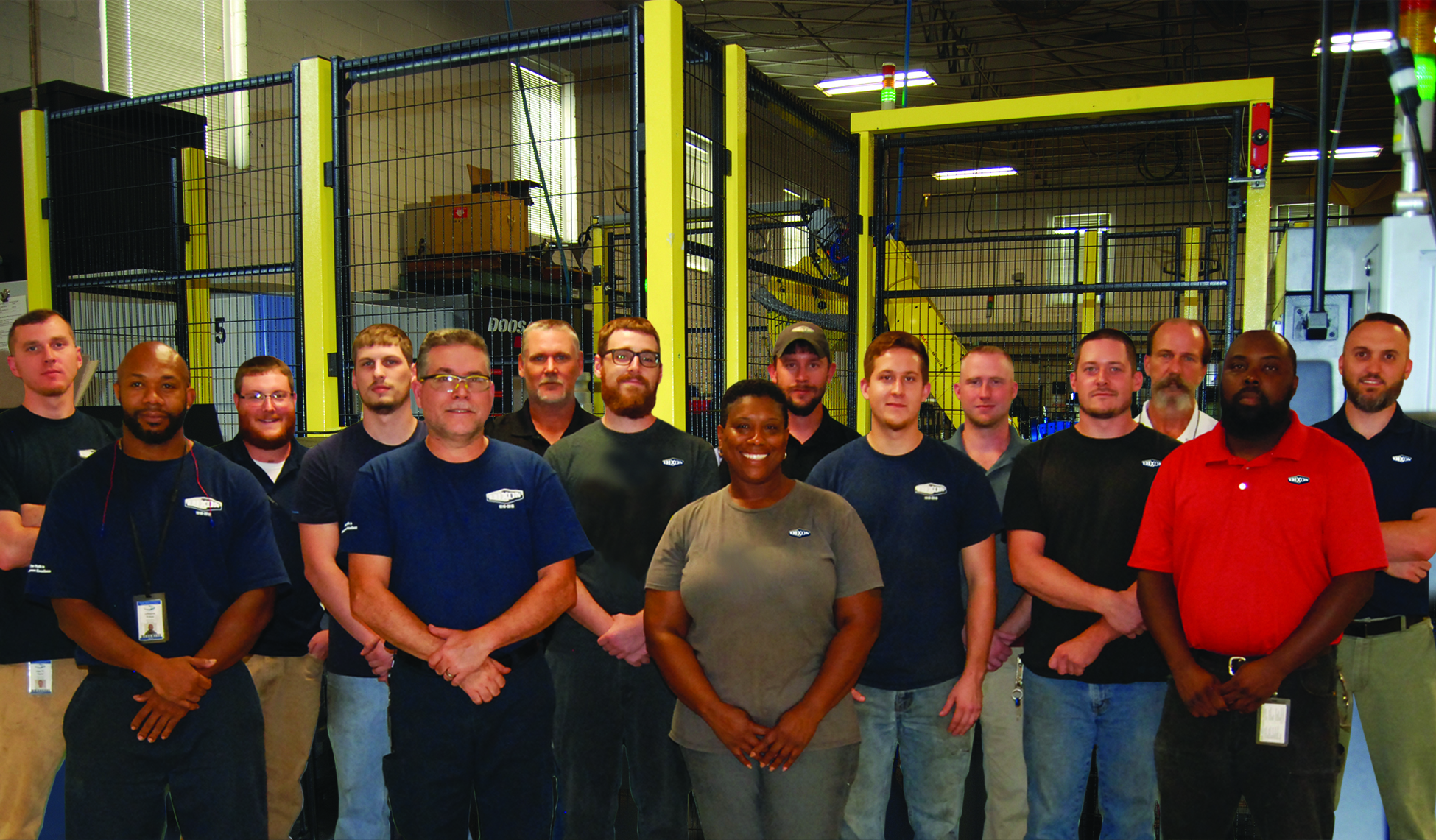 Group picture of Dixon's apprentices, steering committee members and on-the-job trainers