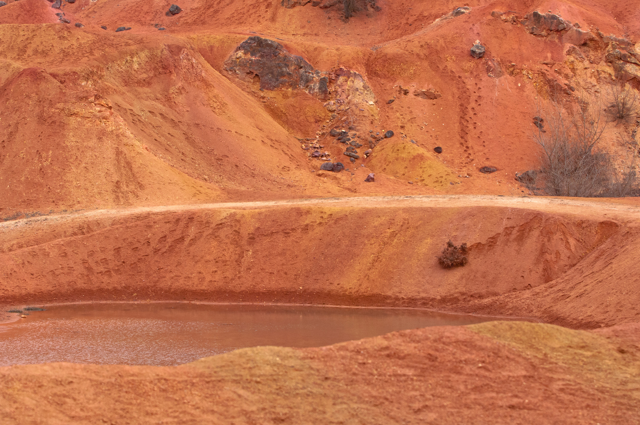Bauxite mine, raw weathered bauxite sedimentary rock on surface